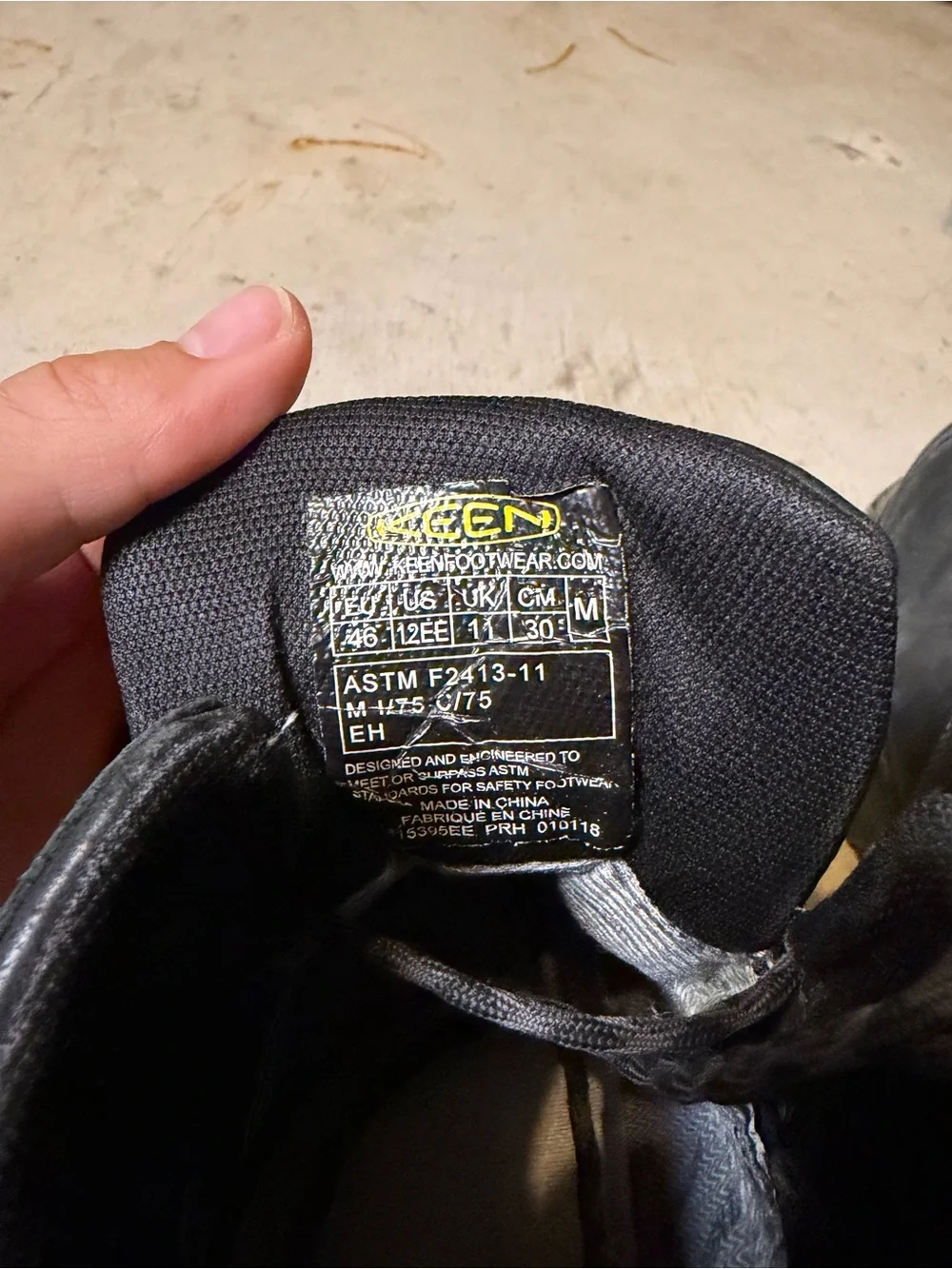 Keen Men's Black Lace-Up Work Boots with Yellow Accents
